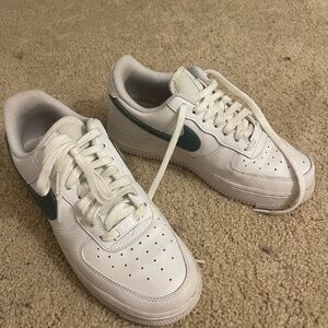 Nike White Sneakers with Light Teal Accents